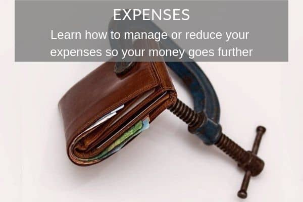Things to Consider as a Digital Nomad - Expenses. Wallet being squeezed by clamp